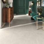 Entrée contemporaine avec carrelage gris clair et décoration vintage